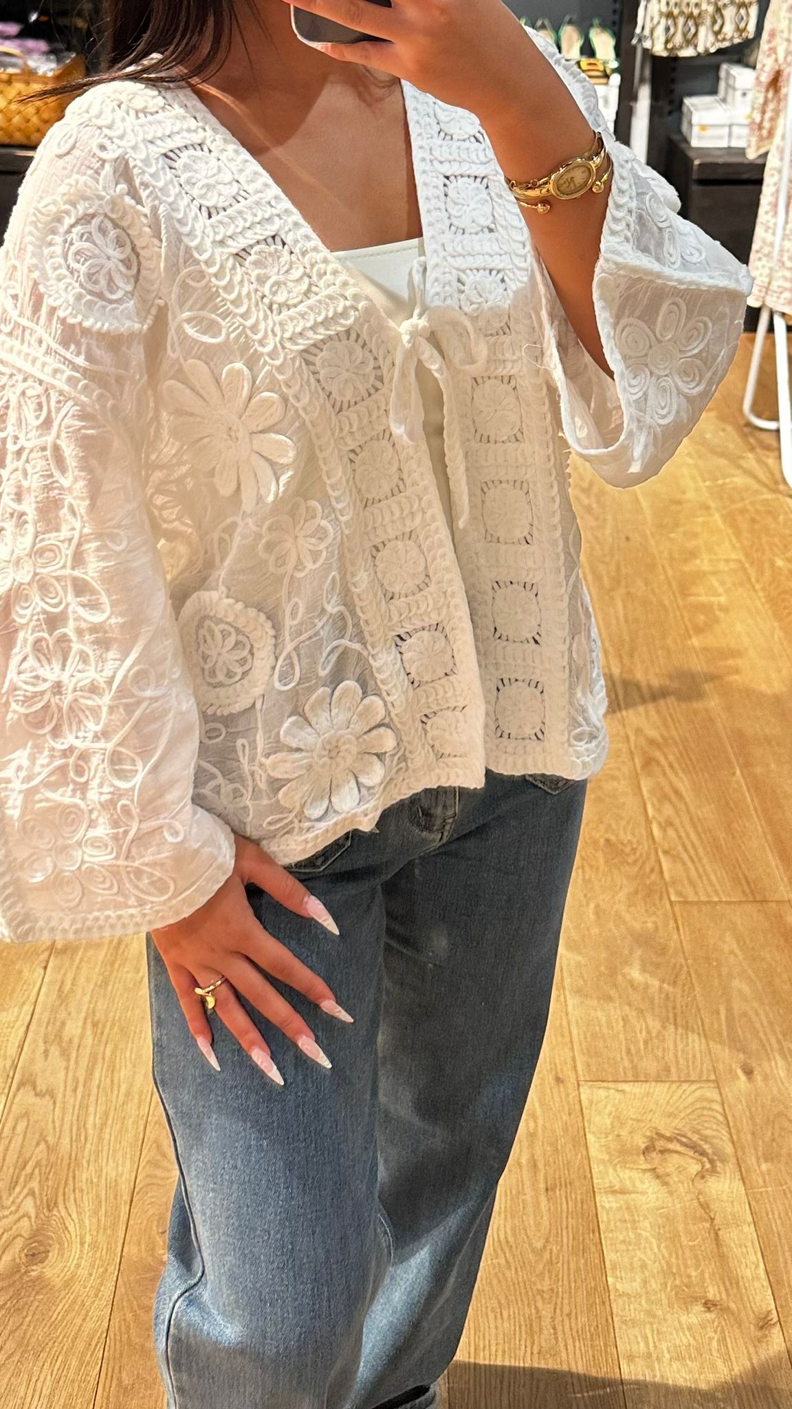 Veste en dentelle à lacet